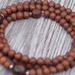 Antique Raktu Seed Japa Mala handmade in Nepal with 108 beads, Bodhi seed spacers, and red nylon string