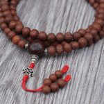Antique Raktu Seed Japa Mala handmade in Nepal with 108 beads, Bodhi seed spacers, and red nylon string