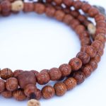 Antique Phoenix Eye Nepali Bodhi Seed Mala With Mala Counter handcrafted in Nepal with skull beads and Dorje tassel
