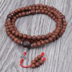 Antique Raktu Seed Japa Mala handmade in Nepal with 108 beads, Bodhi seed spacers, and red nylon string