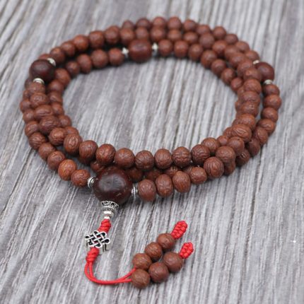 Antique Raktu Seed Japa Mala handmade in Nepal with 108 beads, Bodhi seed spacers, and red nylon string