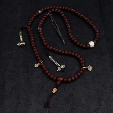 Phoenix Eye Nepali Bodhi seed mala with brass inlay and conch shell beads handmade in Nepal
