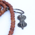 Antique Phoenix Eye Nepali Bodhi Seed Mala With Mala Counter handcrafted in Nepal with skull beads and Dorje tassel