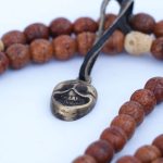 Antique Phoenix Eye Nepali Bodhi Seed Mala With Mala Counter handcrafted in Nepal with skull beads and Dorje tassel