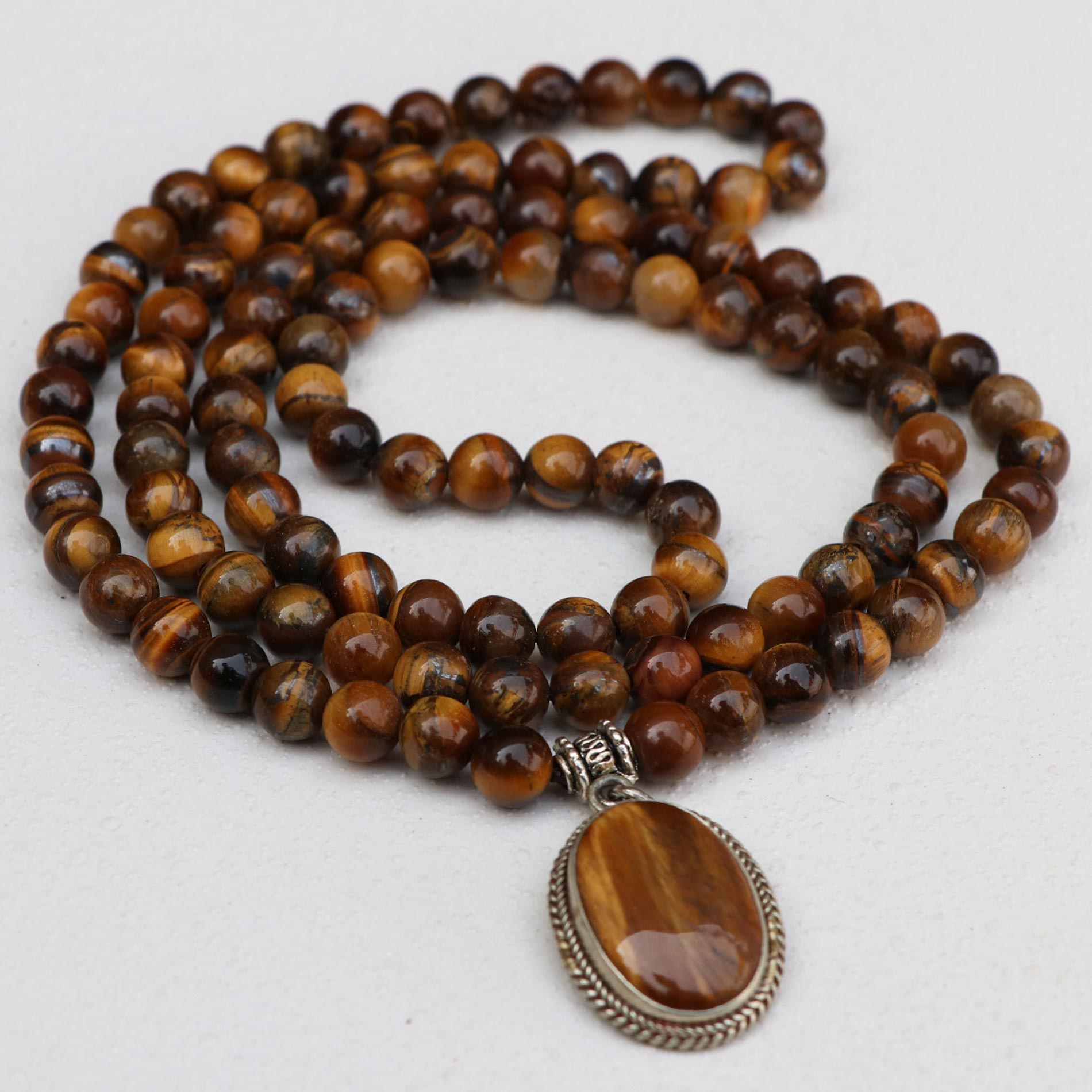 d3432b49-efb4-4166-9cb3-92d8ef0a9adc Tiger Eye Stone Japa Mala With Tiger Eye Pendant
