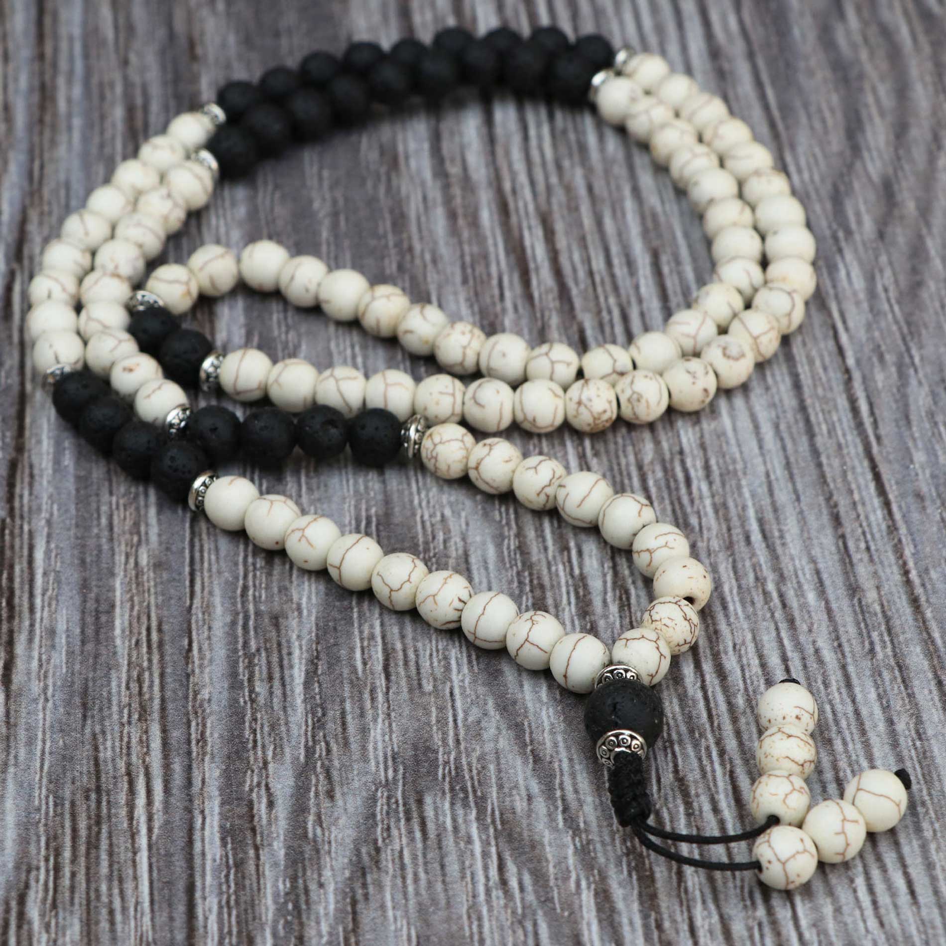 fb9b6382-656e-4450-906d-b776f1faaf08 Howlite Stone Japa Mala With Lava Stone Spacer