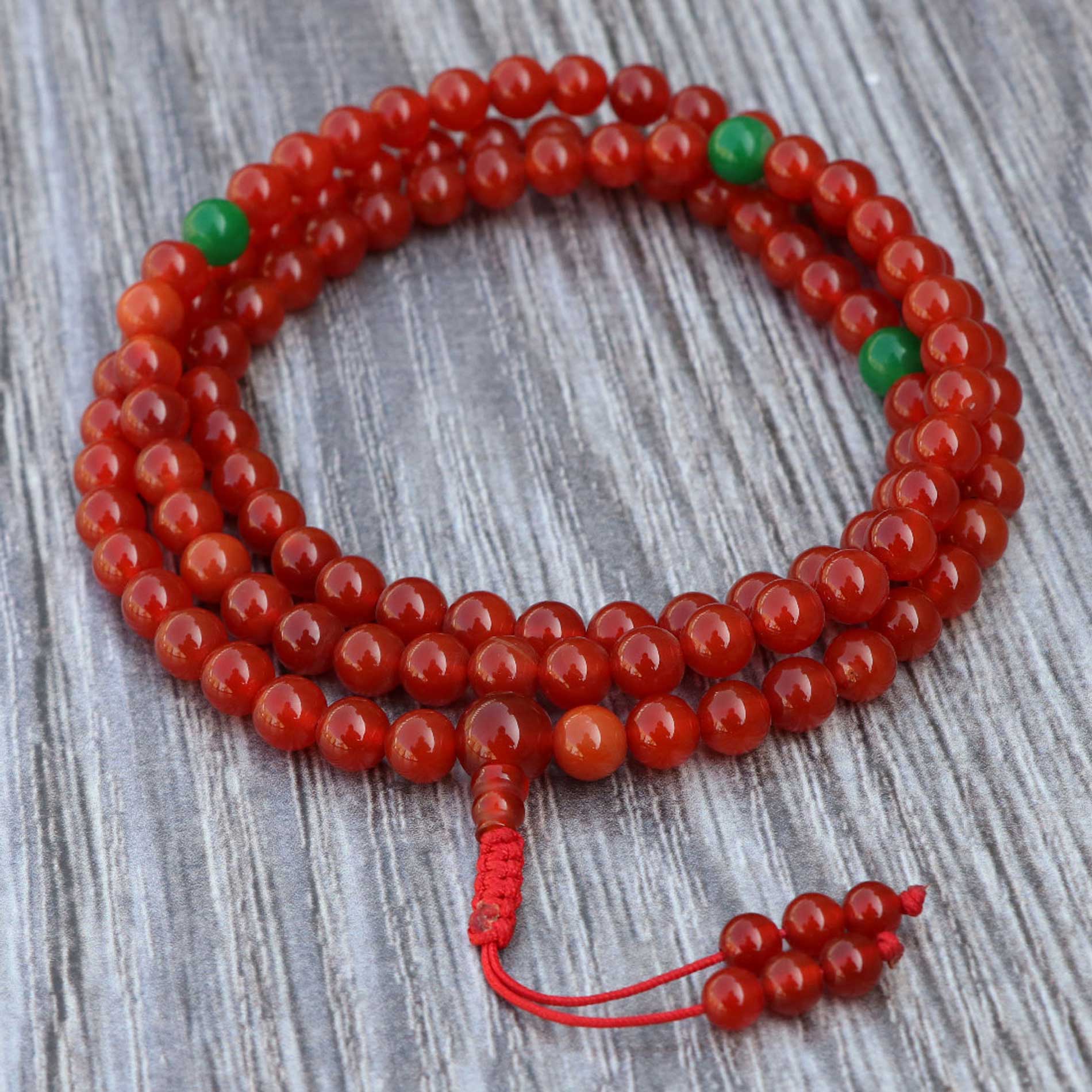 2806ef5c-0c3a-4304-8987-1c791e6f37f6 Carnelian Stone Yoga Mala With Jade Stone Spacer