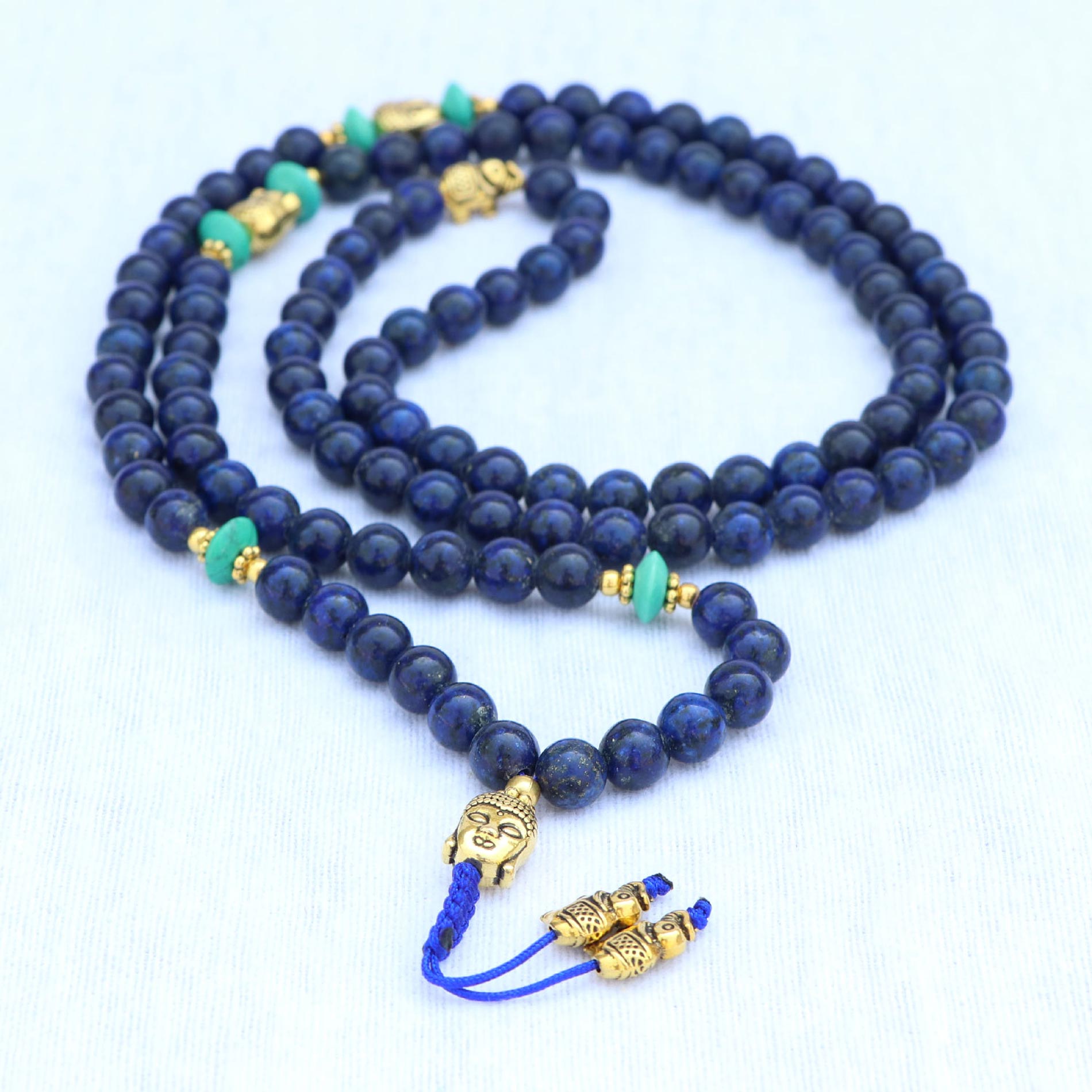 34531d7b-6db7-4ffc-bca5-011809932b15 Buddha Head Lapis Lazuli Stone Japa Mala with Elephant Bead Spacer