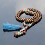 Earth Touching Buddha Charm Tiger Eye Japa Mala
