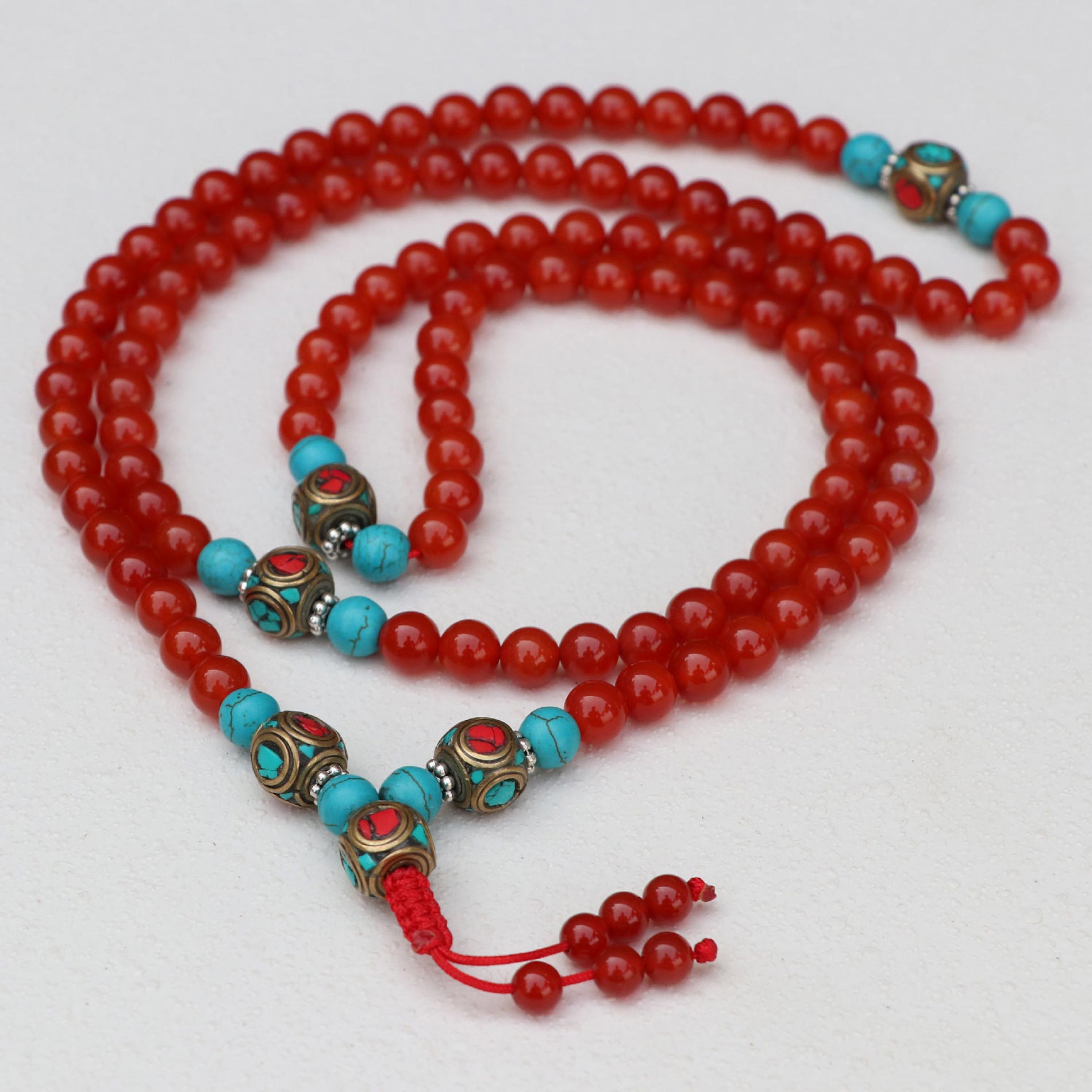 d49fcfe4-3f4d-4def-9b9f-1a934c2f068b Inlaid Brass Carnelian Stone Mala