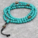 Turquoise Stone Japa Mala with Inlaid Brass Bead
